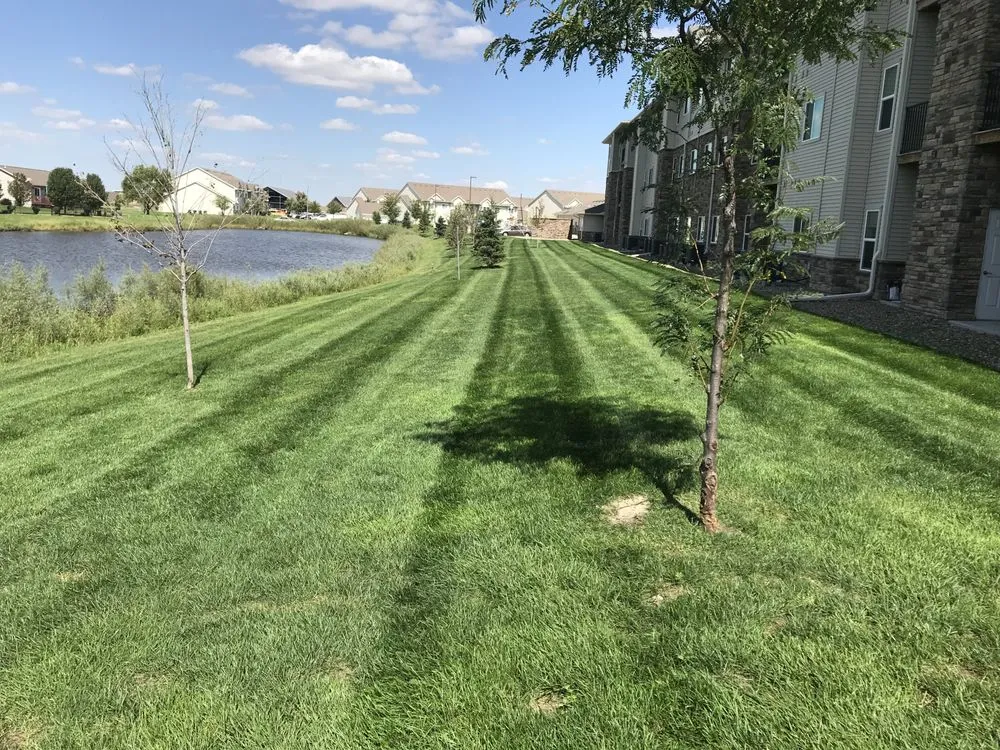 Reliable lawn mowing service for outdoor upgrades in Des Moines, IA by Griff Lawn and Landscape