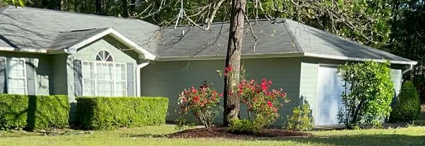 Griffin's Lawn Care Experts Logo