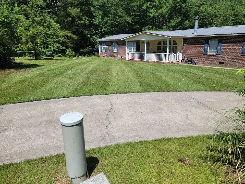 Professional lawn mowing service for homes in Sanford, NC by Griff's Landscaping