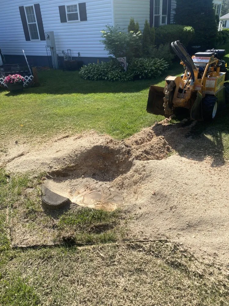 Professional yard maintenance for residential properties in Fairfax, VT by Grinding Gears