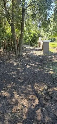 Grindstone Tree Service and Land Worx Logo