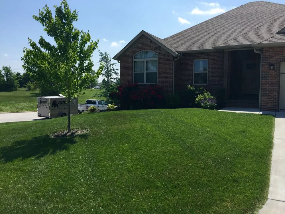 Expert lawn mowing service for beautiful yards in Nixa, MO by GRIZ Home & Yard Improvements
