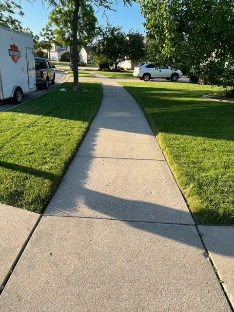 Top-rated lawn mowing service with custom design across RACINE, WI - Grizz Lawn Care