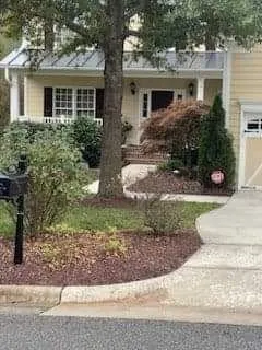 Professional outdoor landscaping with custom design in Durham, NC by Grizzly Tree Removal Service