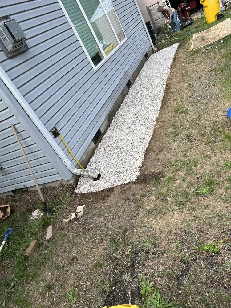 Custom outdoor landscaping in Prince Frederick, MD by Grotto Landscaping