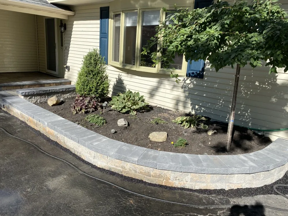 Custom yard maintenance with custom design in Liverpool, NY by Ground Force Property Services