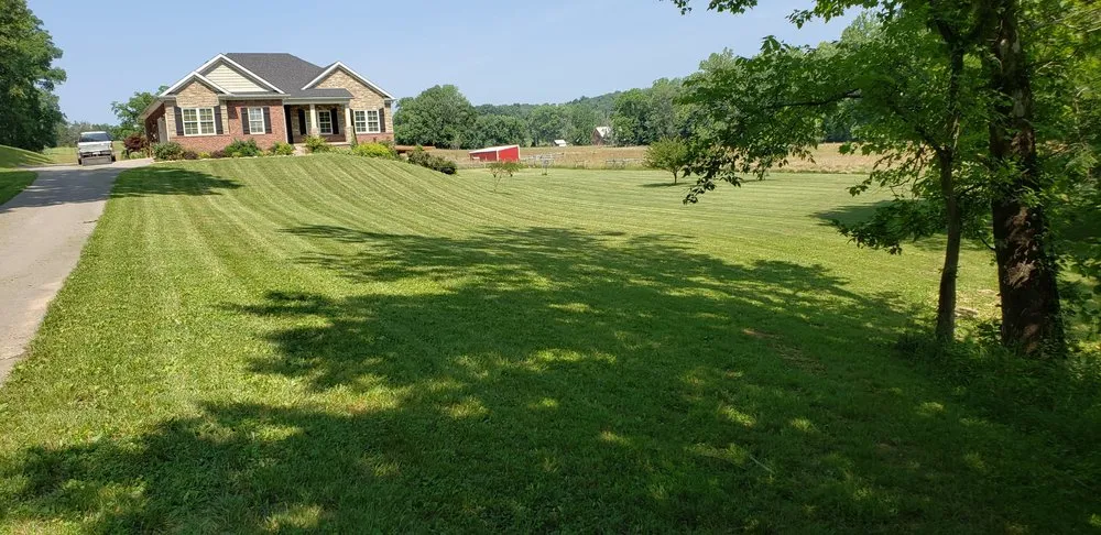 Top-rated residential landscaping experts serving Louisville, KY - Ground Hoggin Lawn Service