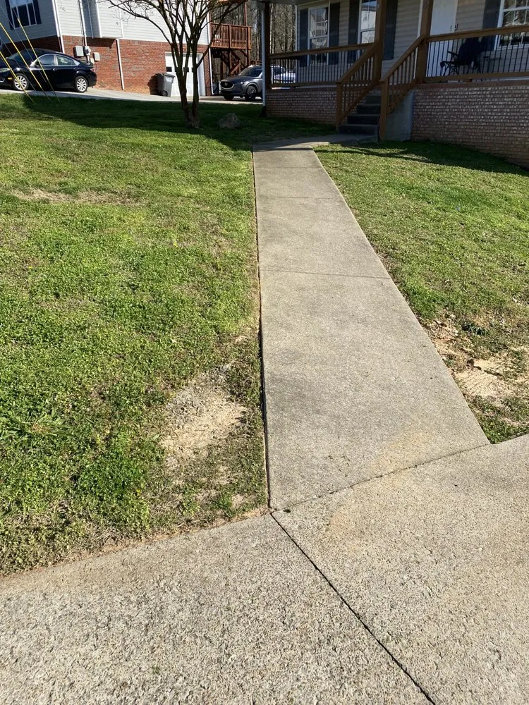 Professional landscape installation with custom design in Clarksville, TN by Ground Up Lawn Service & More