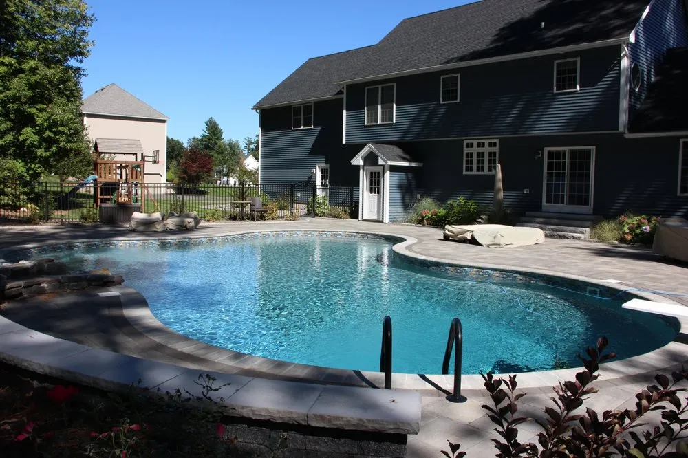 Affordable lawn mowing service for residential properties across Derry, NH - Groundhog Landscaping