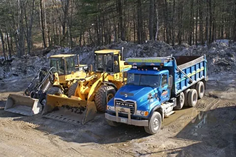 Professional lawn mowing service for residential properties across Derry, NH - Groundhog Landscaping