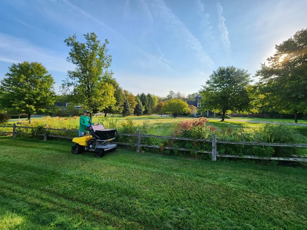 Reliable landscaping services for homes in Queensbury, NY by Groundhogs Lawn Care