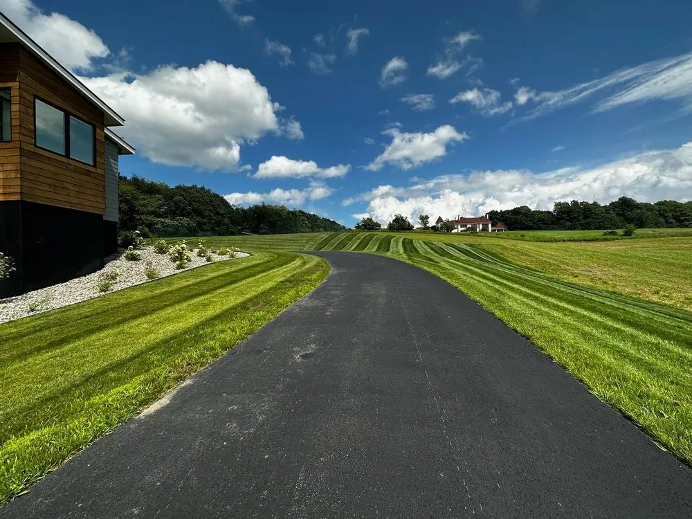 Local yard cleanup service in Queensbury, NY - Groundhogs Lawn Care