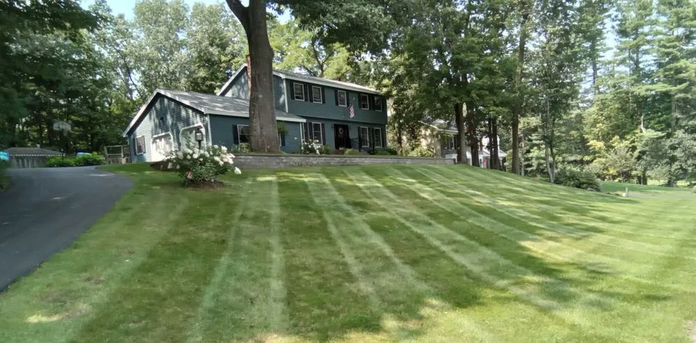 Local landscape design in Queensbury, NY - Groundhogs Lawn Care