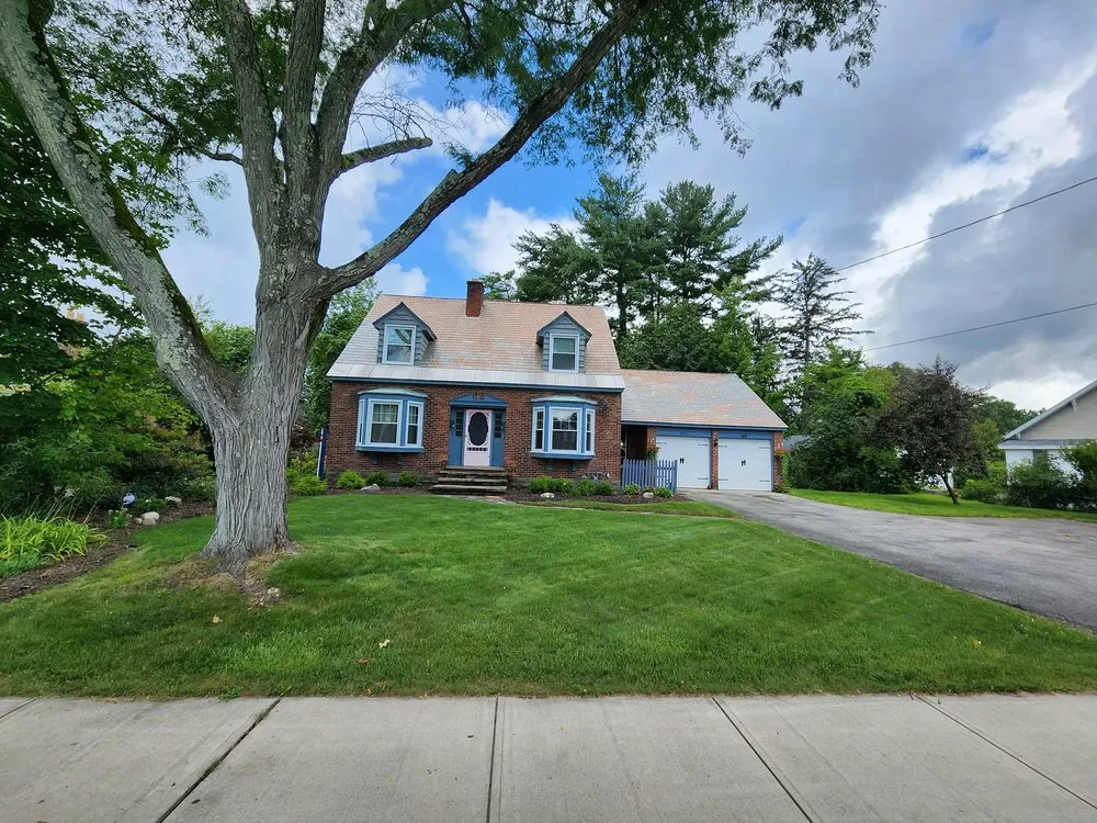 Professional yard maintenance for residential properties in Queensbury, NY by Groundhogs Lawn Care