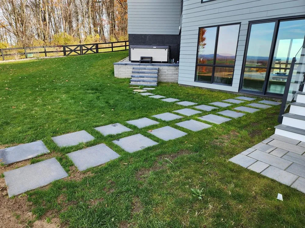 Affordable lawn care service experts serving Queensbury, NY - Groundhogs Lawn Care