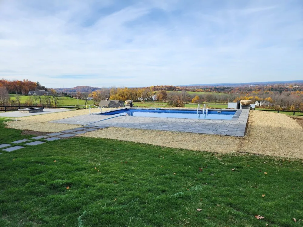 Affordable lawn mowing service in Queensbury, NY by Groundhogs Lawn Care