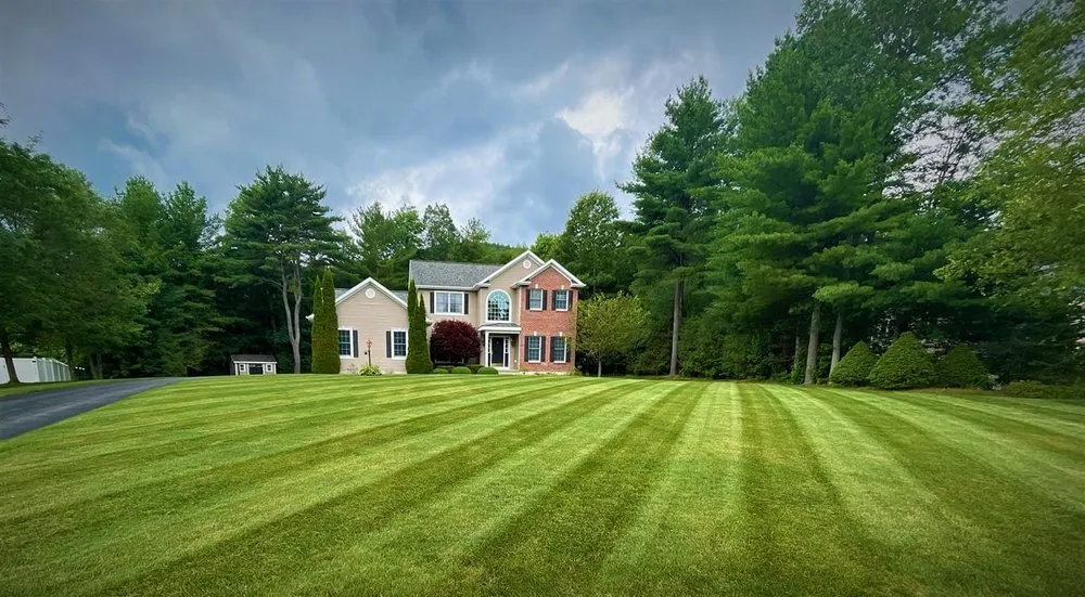 Expert yard maintenance for outdoor upgrades in Queensbury, NY by Groundhogs Lawn Care