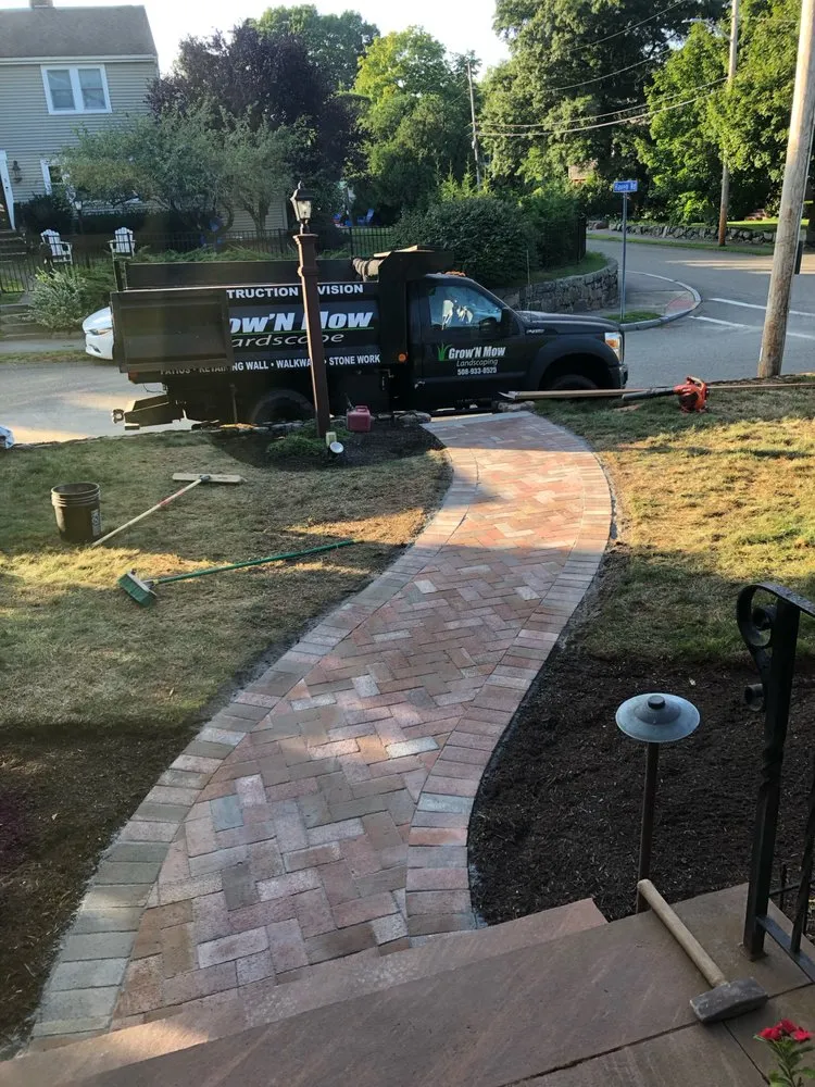 Custom garden landscaping for year-round maintenance in Braintree, MA by Grow'N Mow Landscaping & Hardscaping