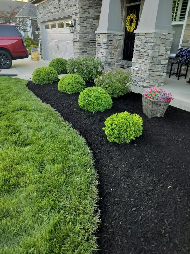Custom landscape installation with custom design in Indianapolis, IN by Grumpy's Landscape & Lawncare