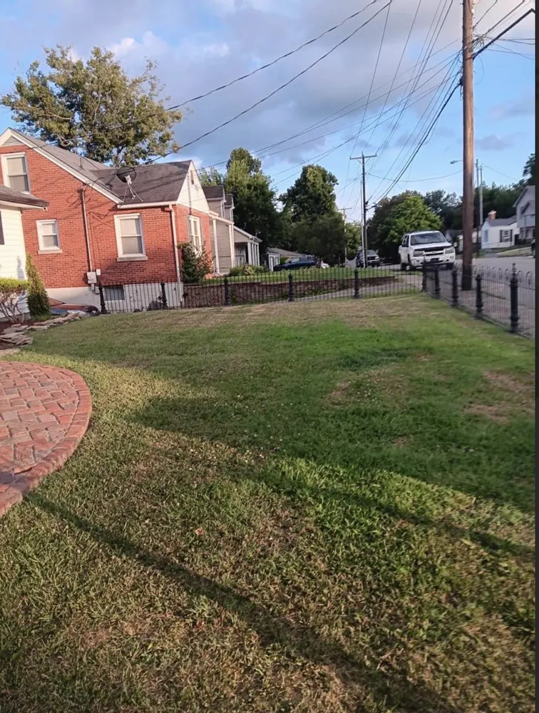 Reliable lawn mowing service for year-round maintenance across Richmond, KY - Gs Outsiders