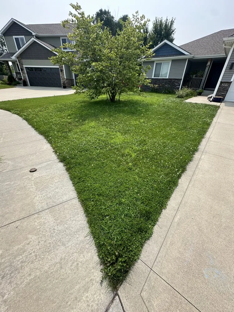 Custom landscape installation with custom design in Bondurant, IA by GSF Lawn Care