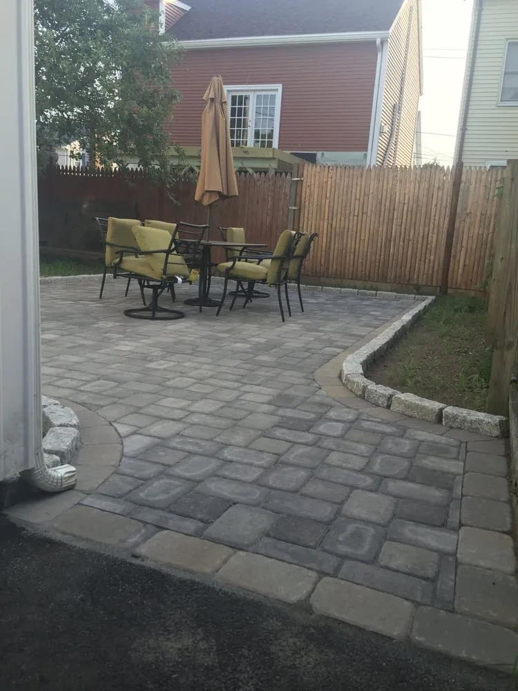 Custom landscape design for year-round maintenance across Lynn, MA - GT OptimoTree Services