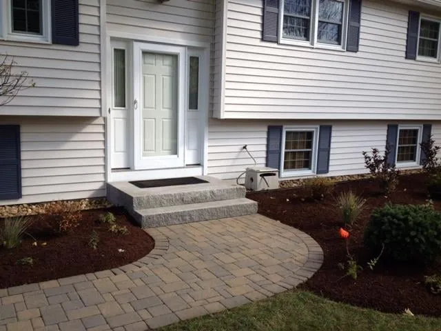 Professional lawn mowing service for residential properties in Tilton, NH by GTM Landscaping & Renovations