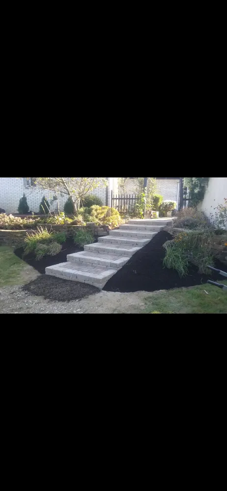 Affordable yard maintenance for residential properties in Indianapolis, IN by GTZ Landscape and Construction