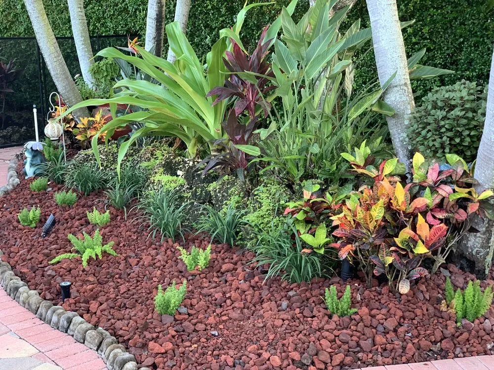 Custom landscape design with custom design in Miami, FL by Guerra Farms