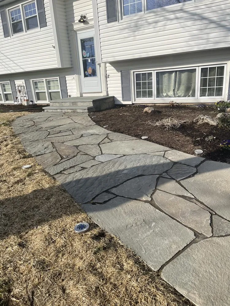 Expert yard cleanup service for year-round maintenance across Guilford, CT - Guerrera Landscaping