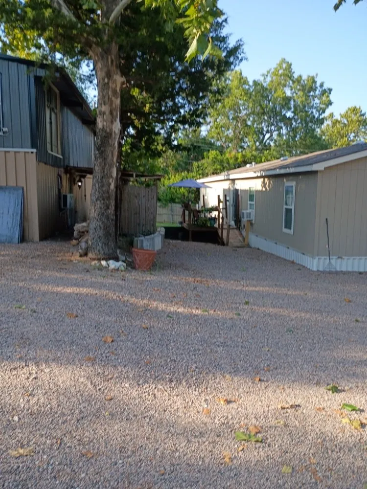 Top-rated lawn care service in Kingston, OK by Guiding Light Construction