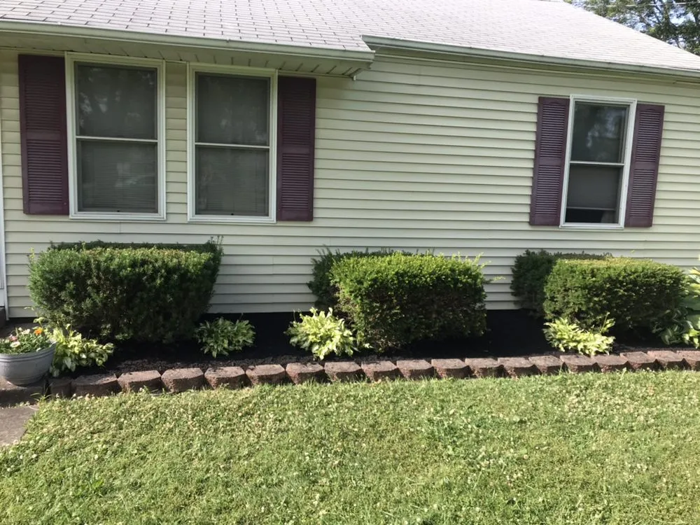 Expert yard cleanup service with custom design across Niagara Falls, NY - Guiliani Construction and Landscaping