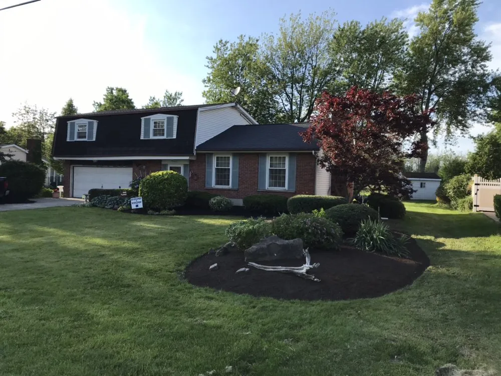Local lawn care service for year-round maintenance in Niagara Falls, NY by Guiliani Construction and Landscaping