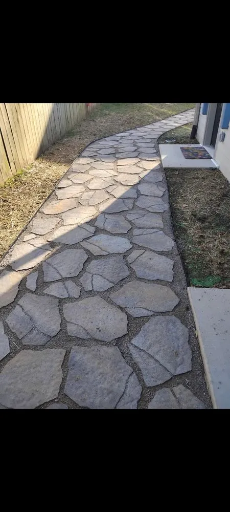 Custom landscape installation in Madison, TN by Gumby's Landscaping