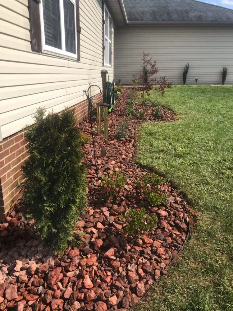 Custom landscape installation in Somerset, KY by Gumm Lawn & Land