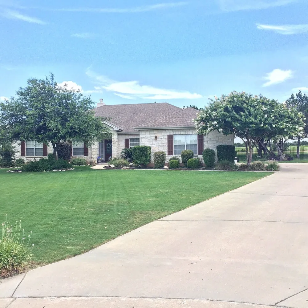 Expert lawn mowing service for residential properties in Austin, TX by Gunners Lawn Care