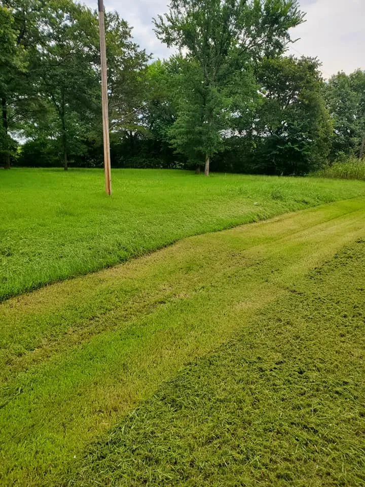 Local lawn mowing service for year-round maintenance across Sherman, TX - Gun's & Hose's of Texas