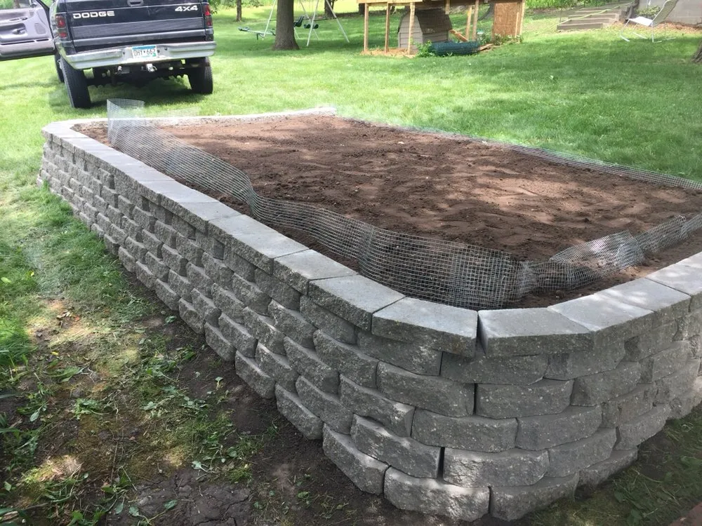 Affordable garden landscaping for homes across Faribault, MN - GUTY LAWN CARE