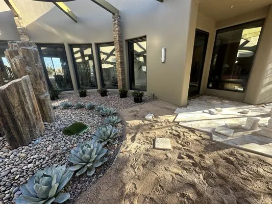 Guys landscaping Logo