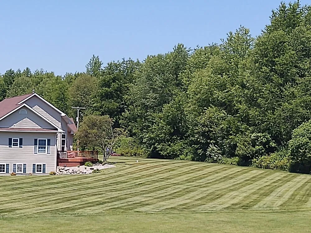 Custom landscape installation in Battle Creek, MI by Guys with Ties Lawn Care