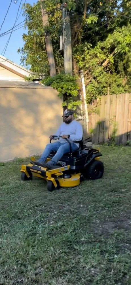 Custom garden landscaping for year-round maintenance in Miami, FL by Guzarc lawn services