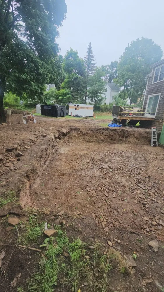 Top-rated yard cleanup service for outdoor upgrades in Clinton, MA by Guzman Construction