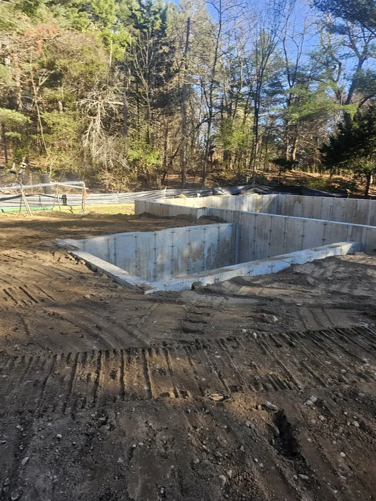 Affordable lawn care service for year-round maintenance in Clinton, MA by Guzman Construction