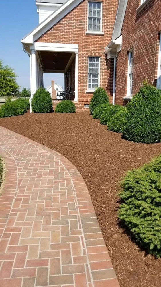 Professional yard maintenance with custom design in Springfield, VA by Guzman Landscaping