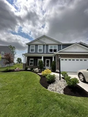 Guzman Next Level Landscaping Logo