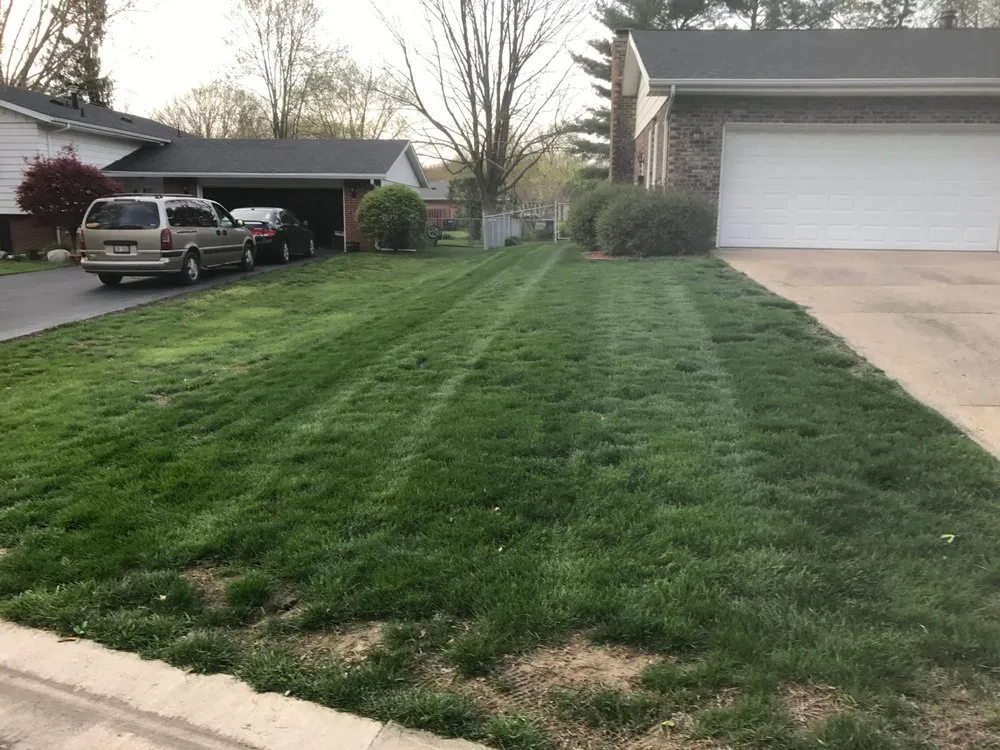 Custom landscaping services for beautiful yards across Bismarck, IL - H & S Lawn Service