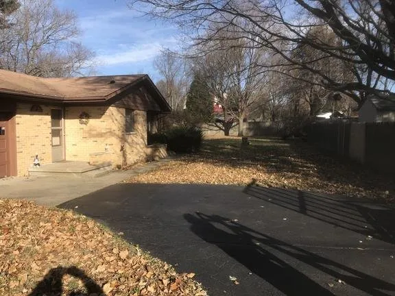 Custom landscape installation in Bismarck, IL by H & S Lawn Service