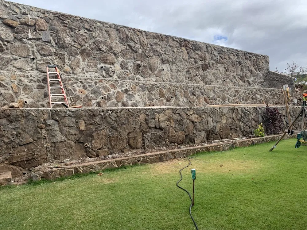 Reliable lawn mowing service for homes in Ocean View, HI by H T M Masonry