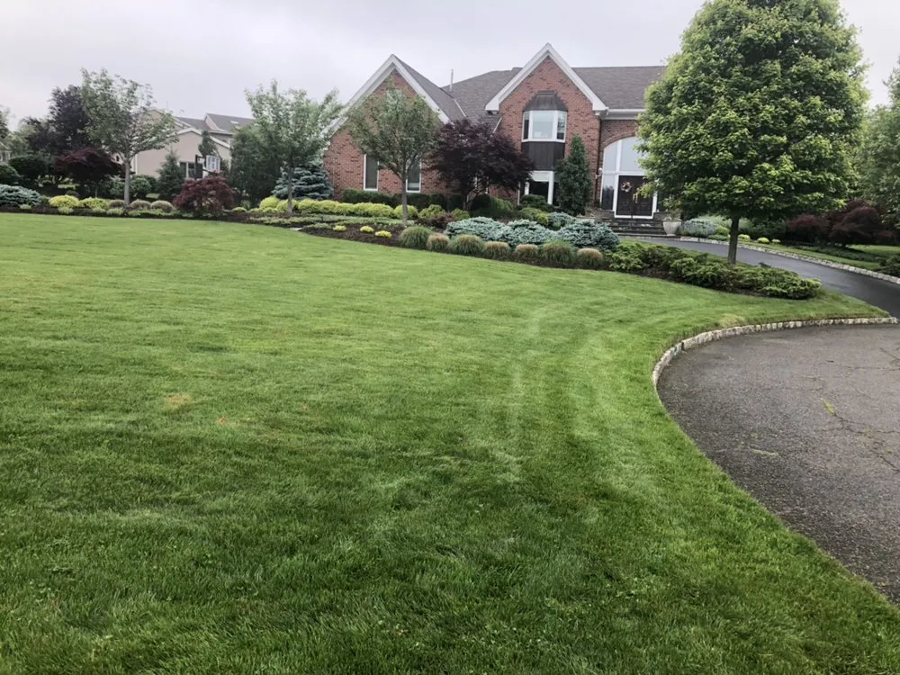 Professional lawn care service for residential properties in Caldwell, NJ by HAA Landscaping