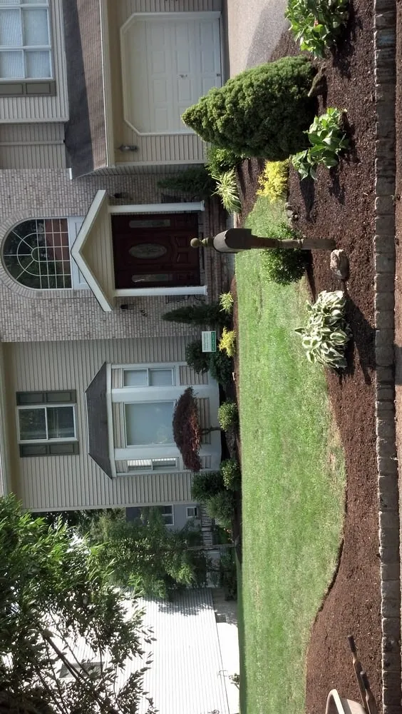 Custom landscape installation with custom design in Parsippany, NJ by Habermann Landscaping